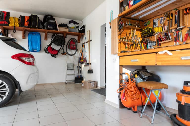 Clean and organized garage with space to park a car